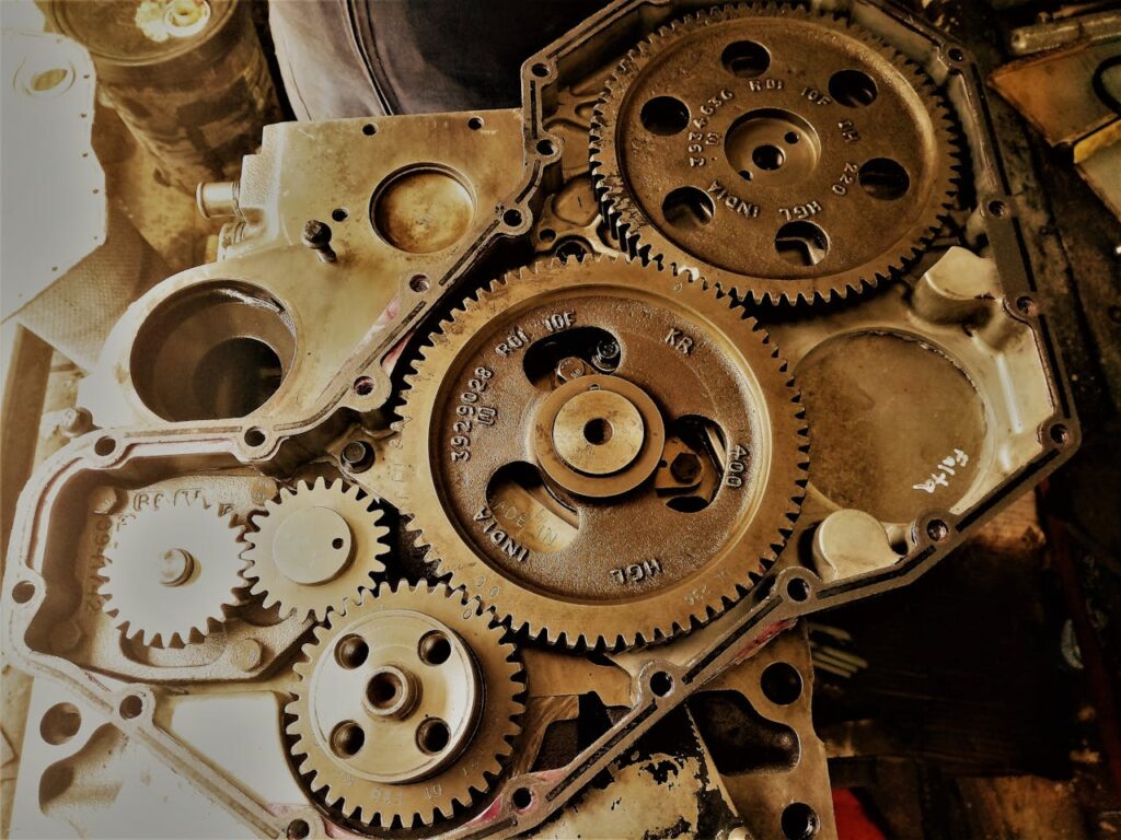 Trusted Gearbox & Engine Repair Specialists Bergplaats | 064 285 0575 Detailed view of interconnected gears showcasing engineering precision and technology in a workshop.