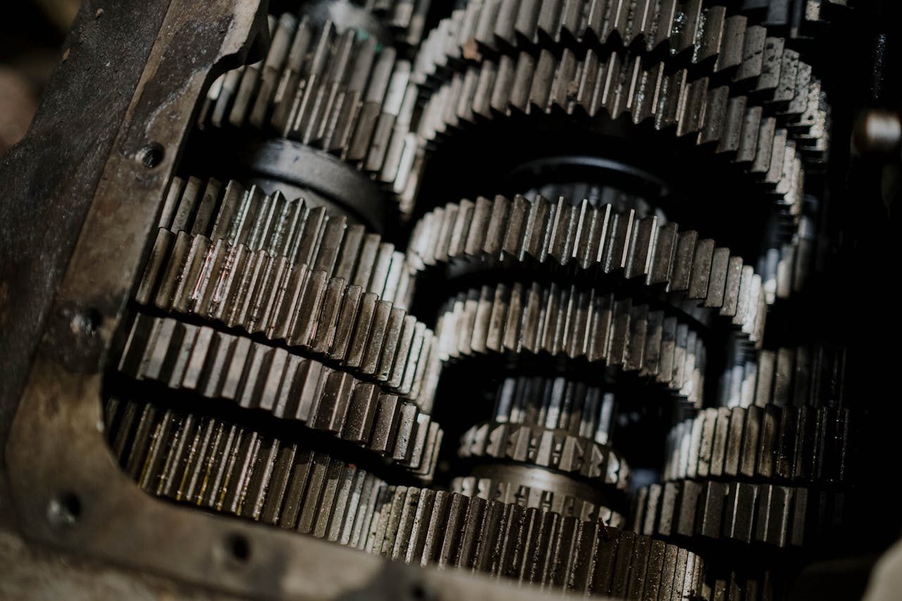 About Detailed shot of mechanical gears showcasing intricate steel parts and engineering precision.